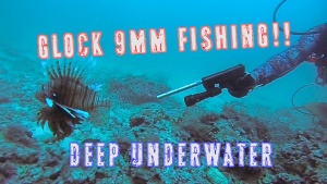 Scuba Assassins Culling Lionfish with A Glock  [Video]